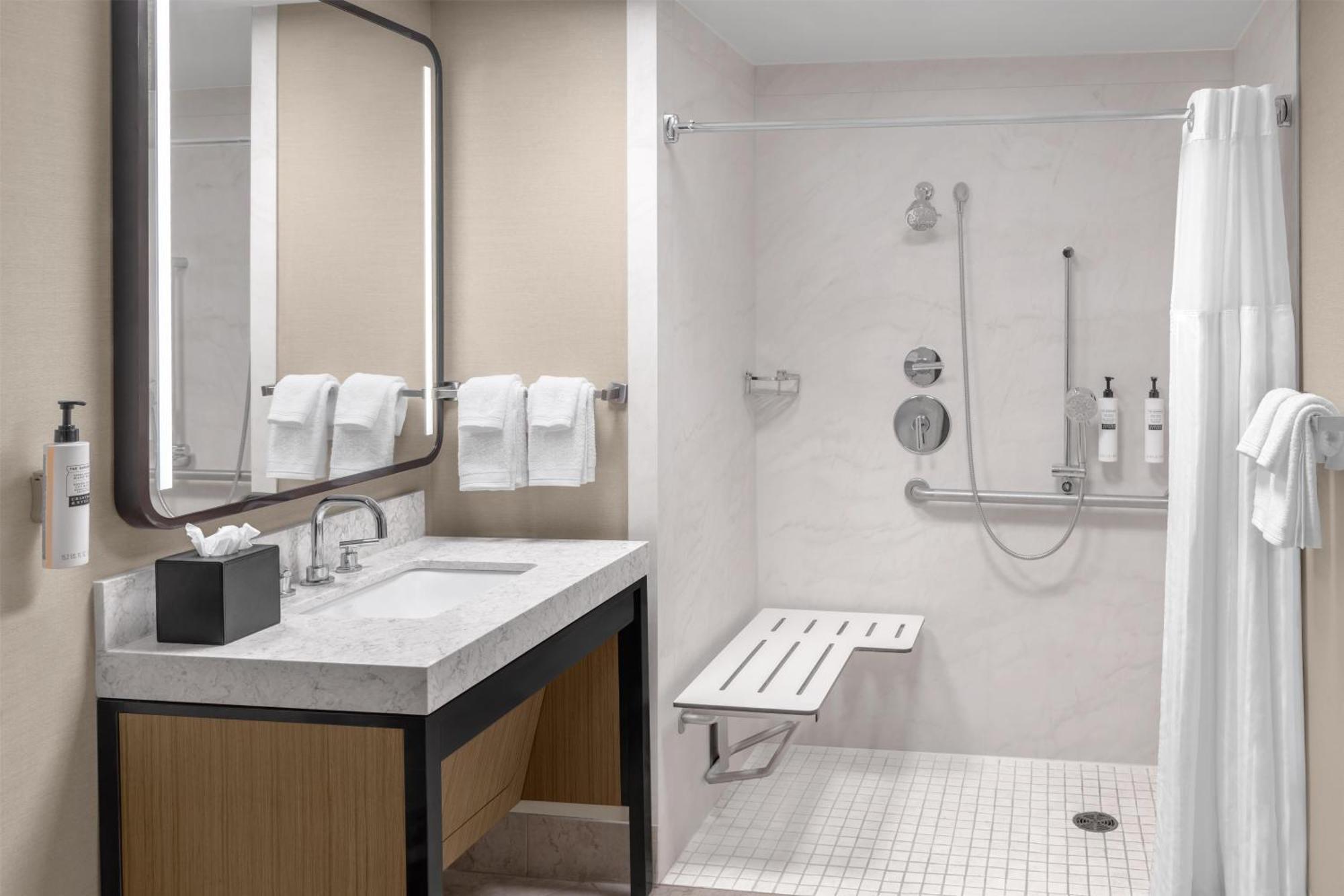 Suite Two Queen Beds Roll Shower Mobility Hearing Access